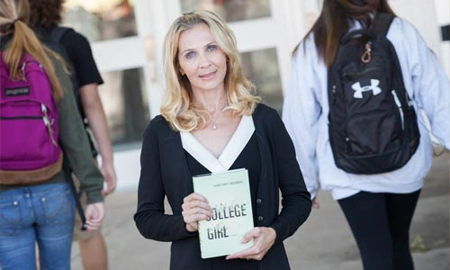 Laura Gray-Rosendale with her book