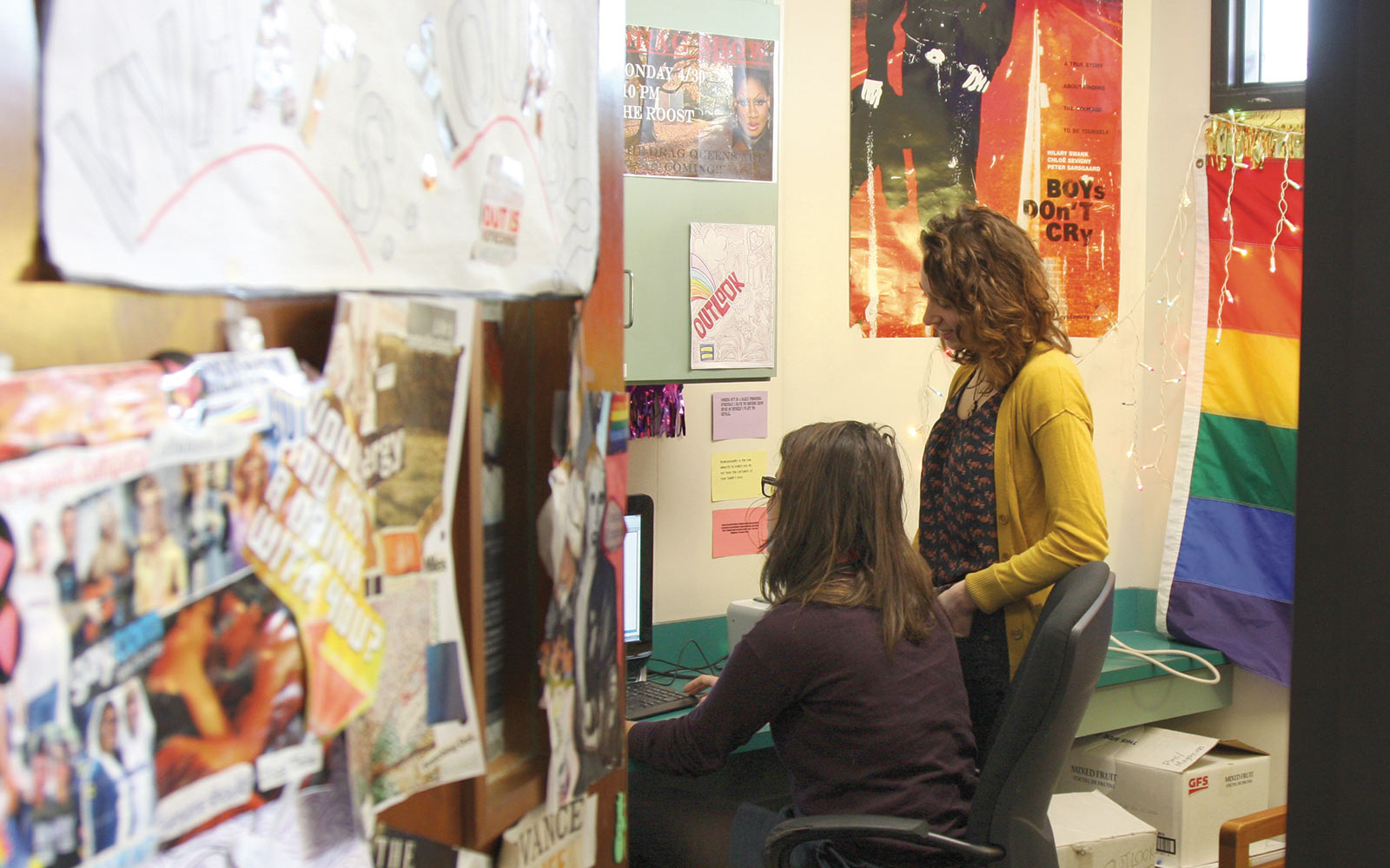 2013 - Caitlyn Battaglia '13 the current vice president of Outlook, and Taylor Klassman '13, the group's president, hang out in the Outlook office in Slayter. The office was given to the organization in 1995 by the Denison Campus Governance…