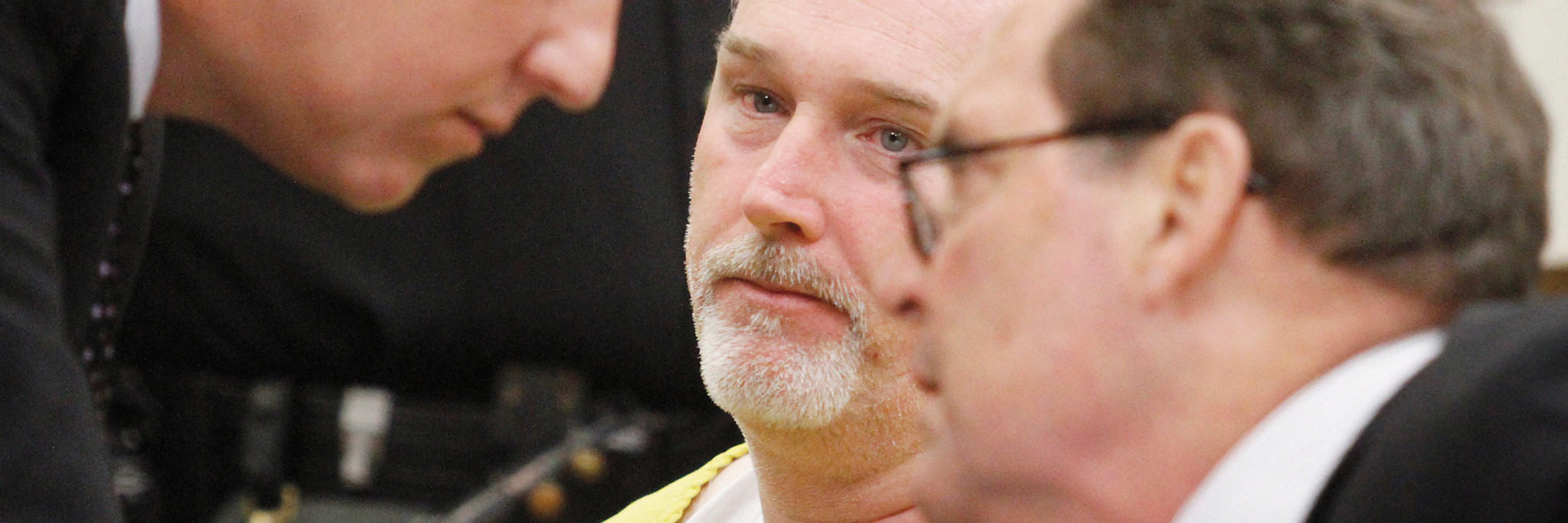 Attorney Mark Godsey (left) consults with Jim Petro as the pair fight to free Dean Gillispie from prison. Photo: Chris Stewart/Dayton Daily News