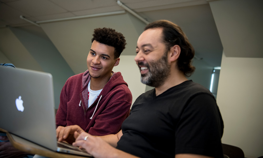 Student with professor learning