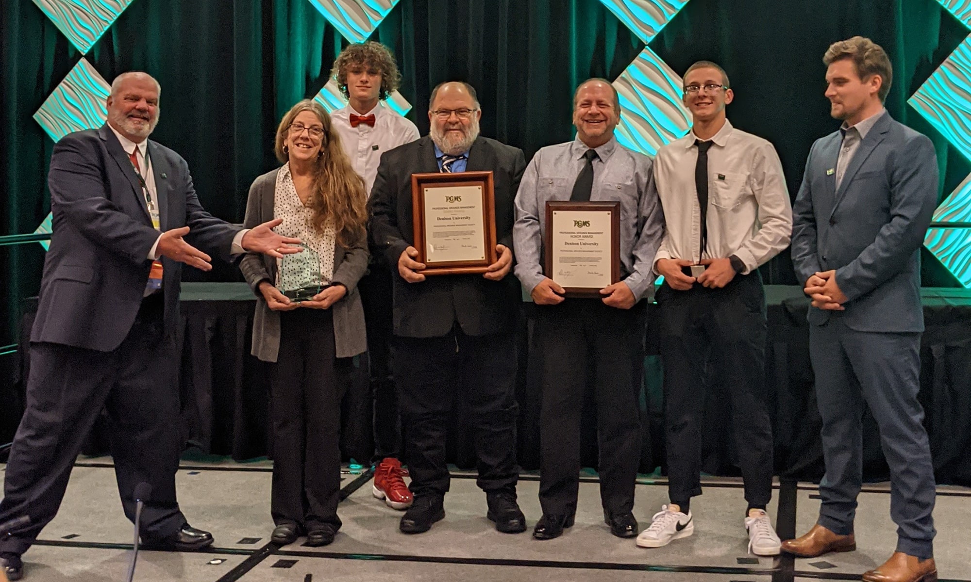 Kevin Mercer and Crew receiving an award