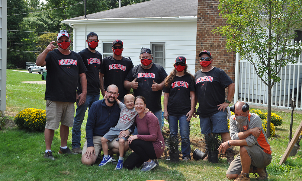 Grounds crew with Andrew and his family