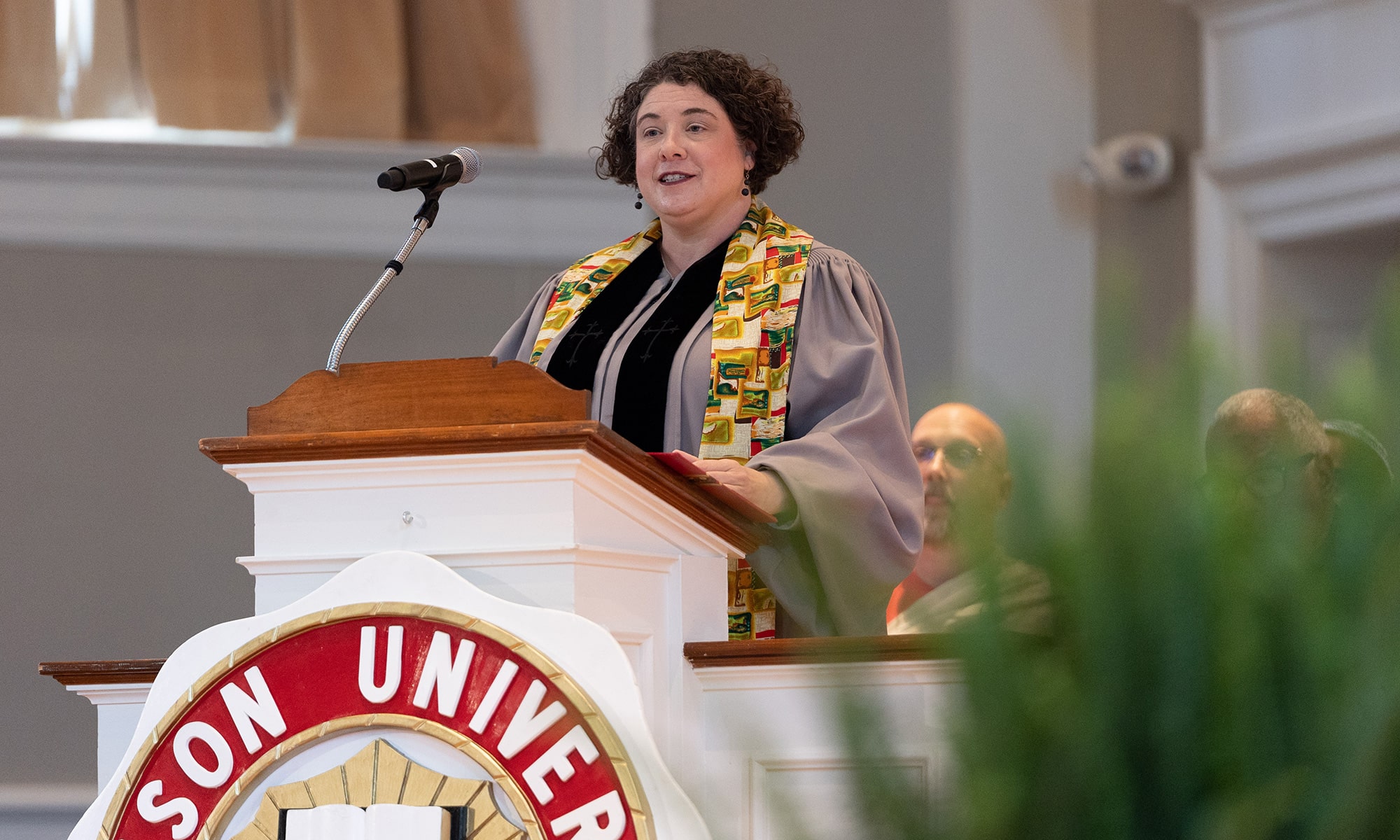 Chaplain Stephanie McLemore addresses the audience in Swasey Chapel