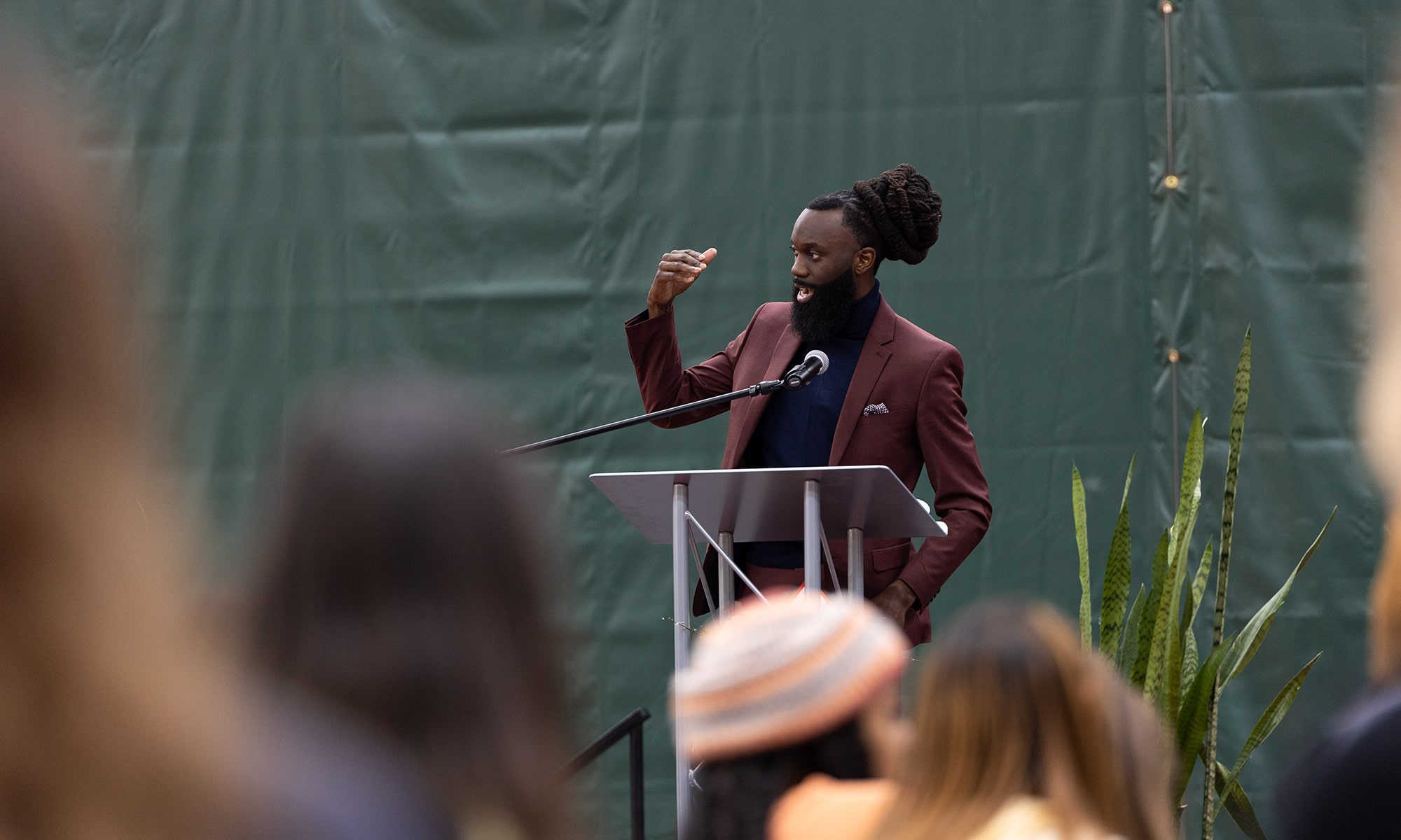 Storyteller and poet Dr. Wilson Okello, an assistant professor of education at Penn State, addresses students at the Mitchell Center.