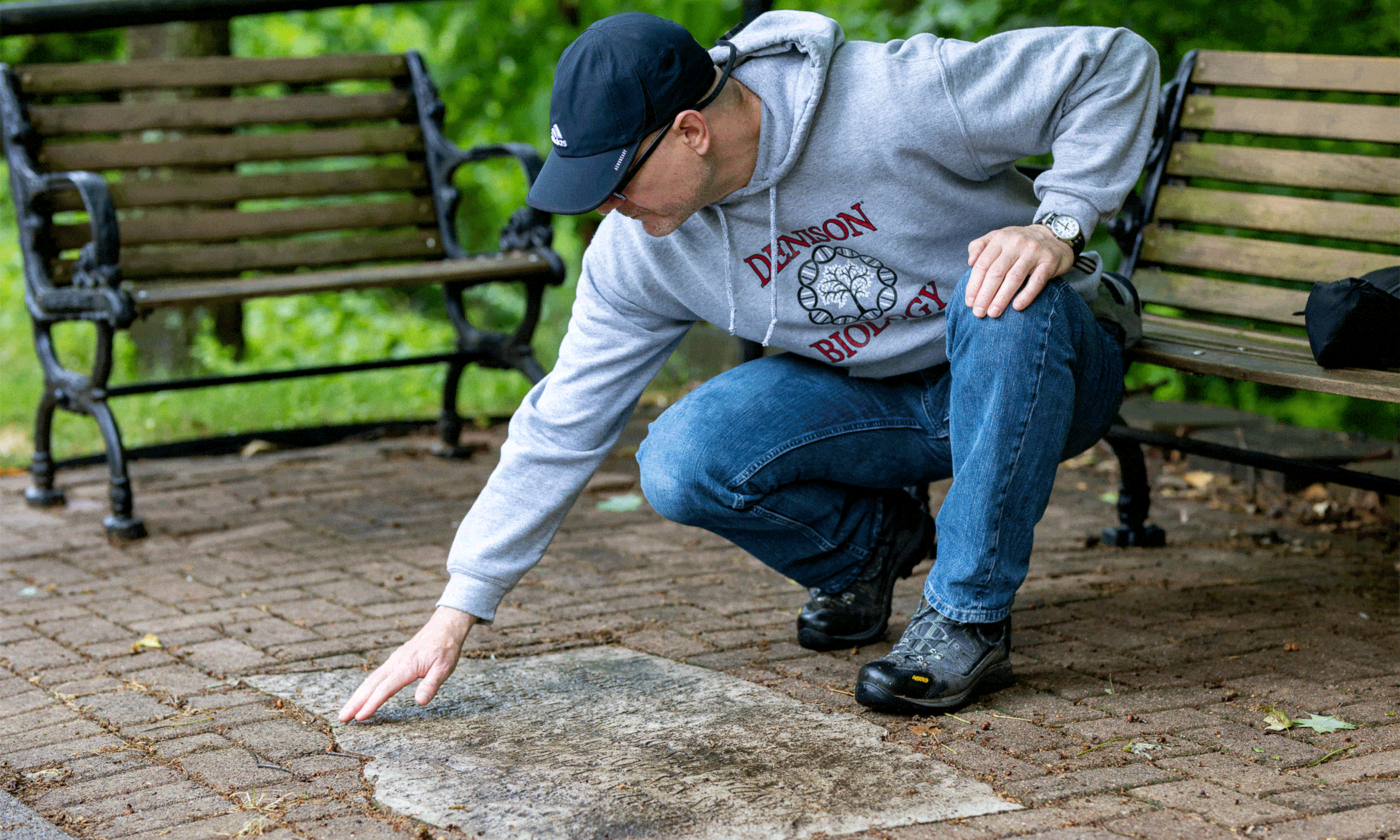 Photo of Hauk touching limestone tablet