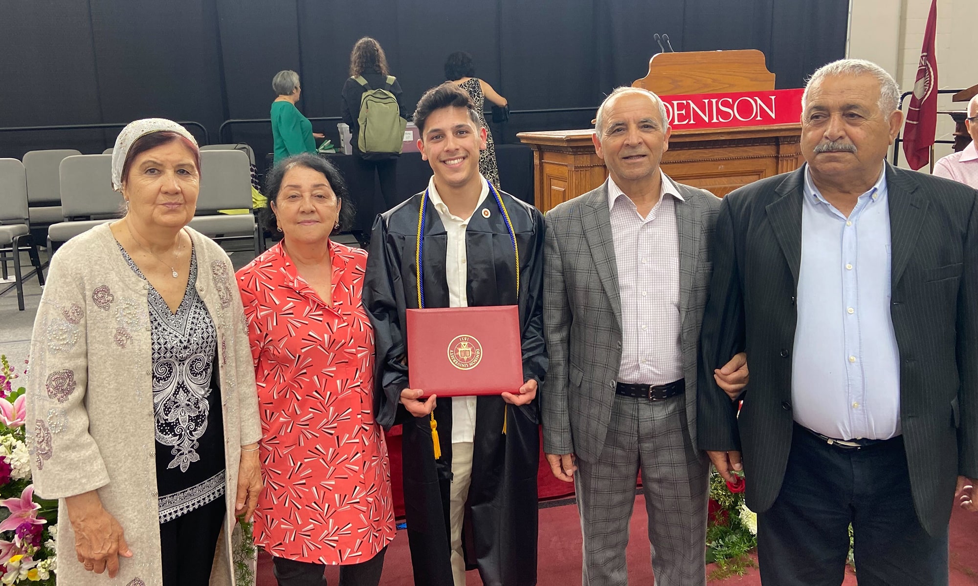 Shamshod Khuseynov with his grandparents