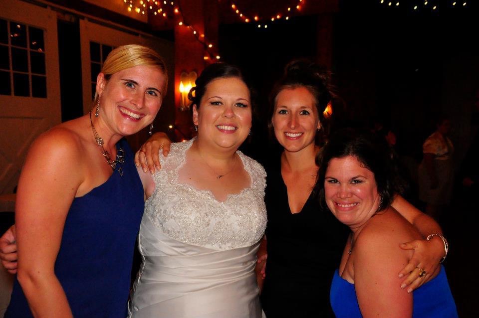 From left: Krista Lehde, Julie Wilson, Kate Armbrust, and June Torres at Wilson and Sauerwald’s wedding on Sept. 8, 2012. 