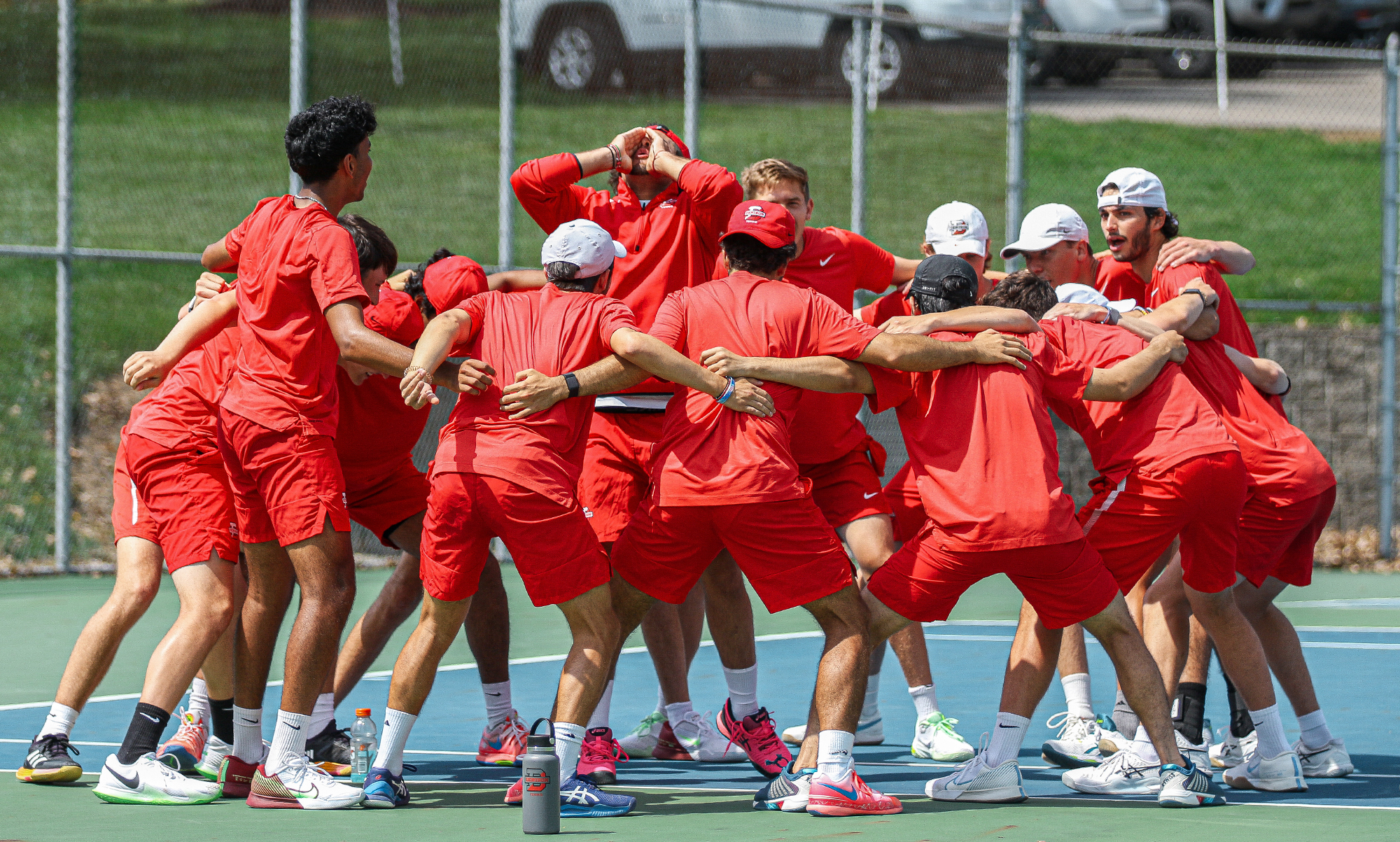 The tennis team celebrates