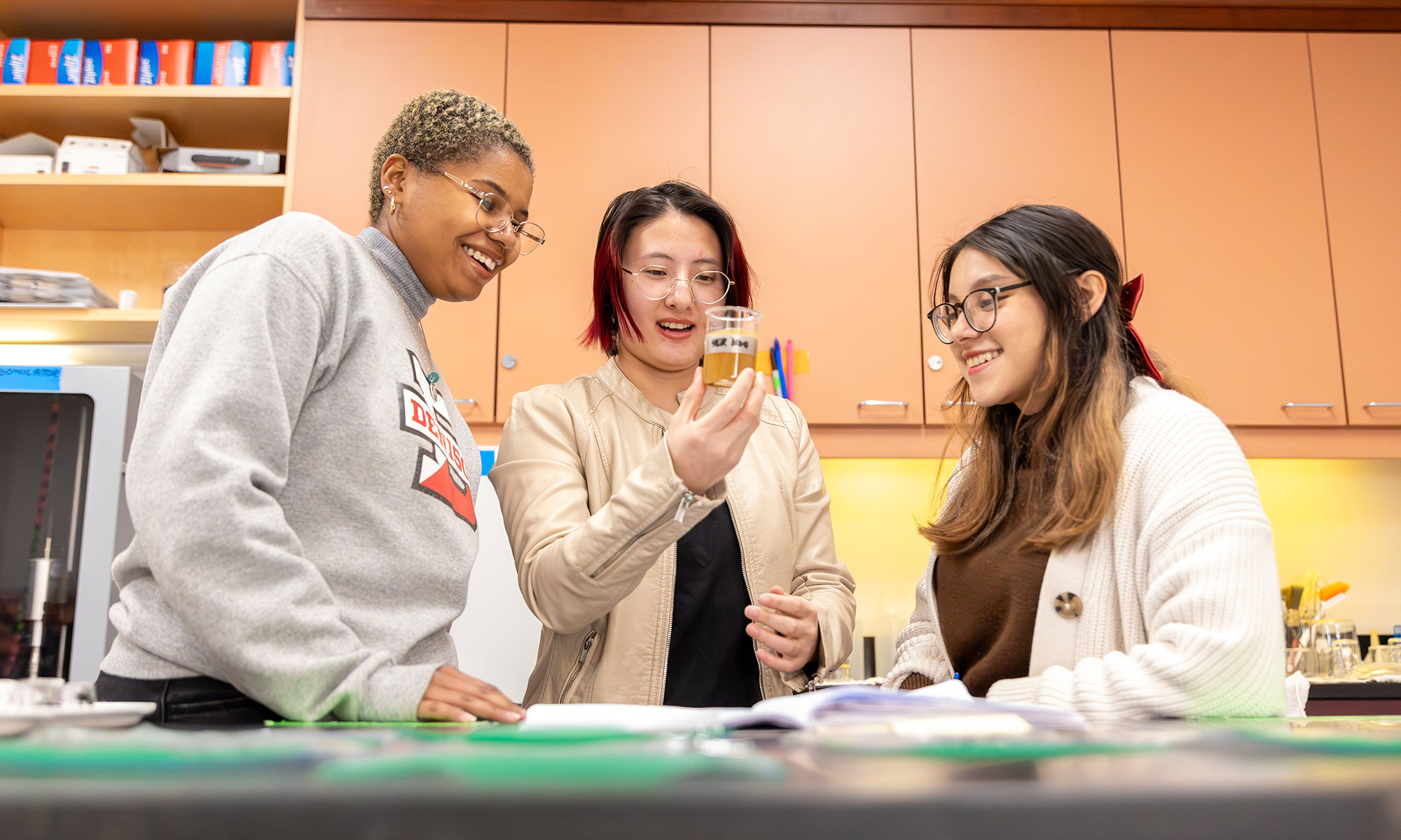 Three students in a lab