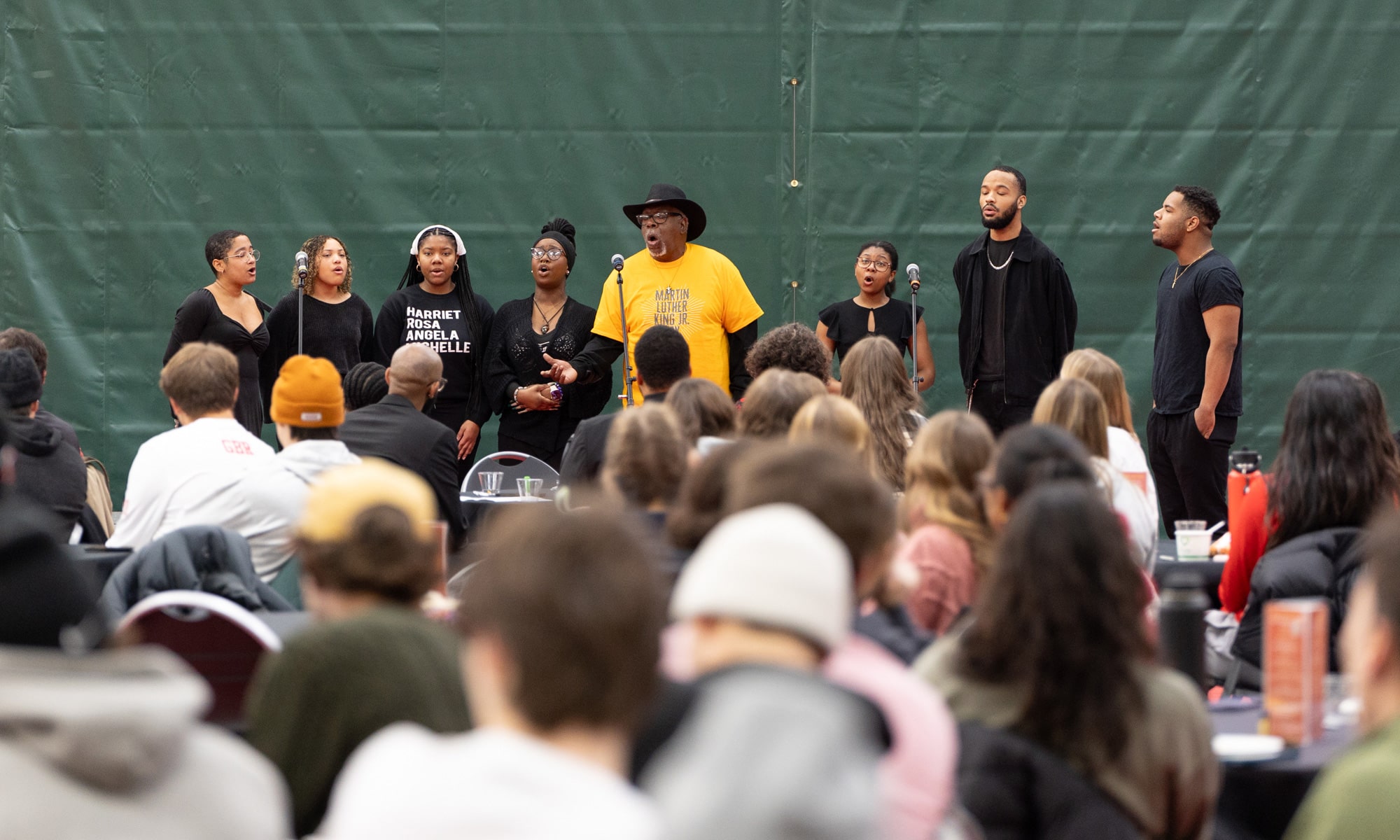 Timothy Carpenter, center, leads the African-American Roots Ensemble in a song.