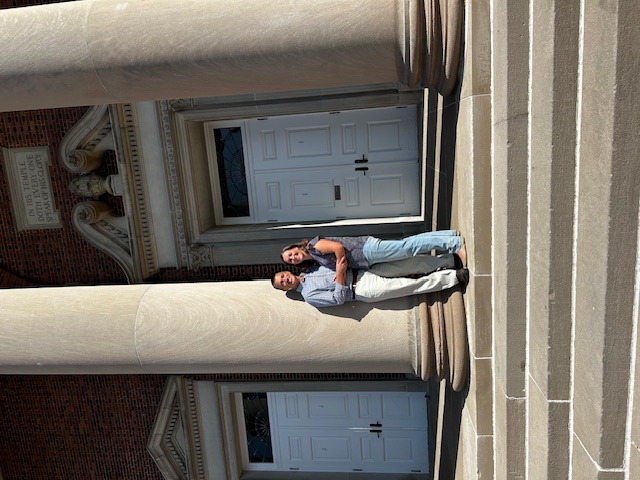 The Boyds on the step of Swasey Chapel