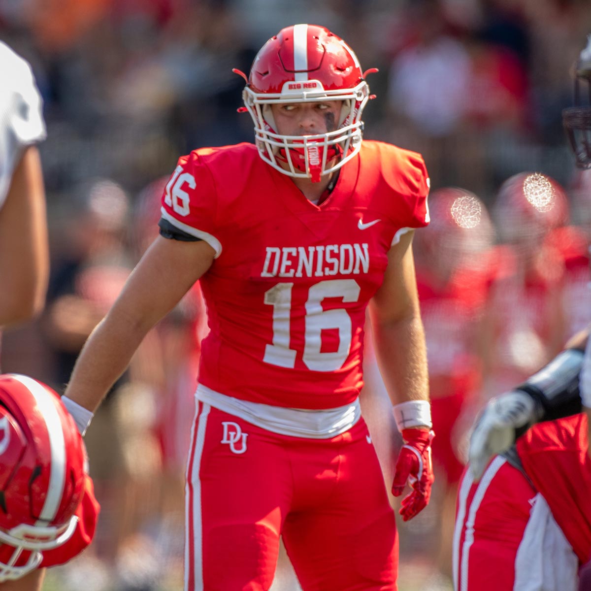 Denison football player on the field.