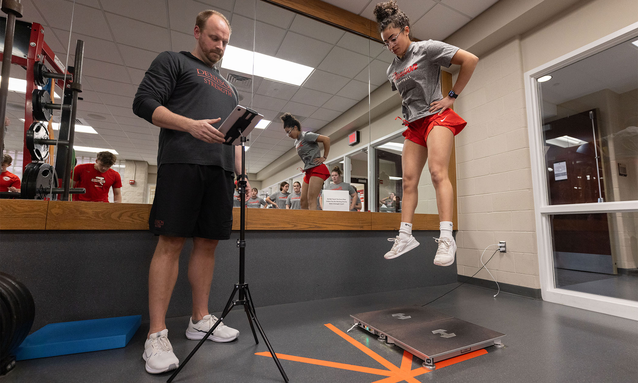 Student using vertical jump machine