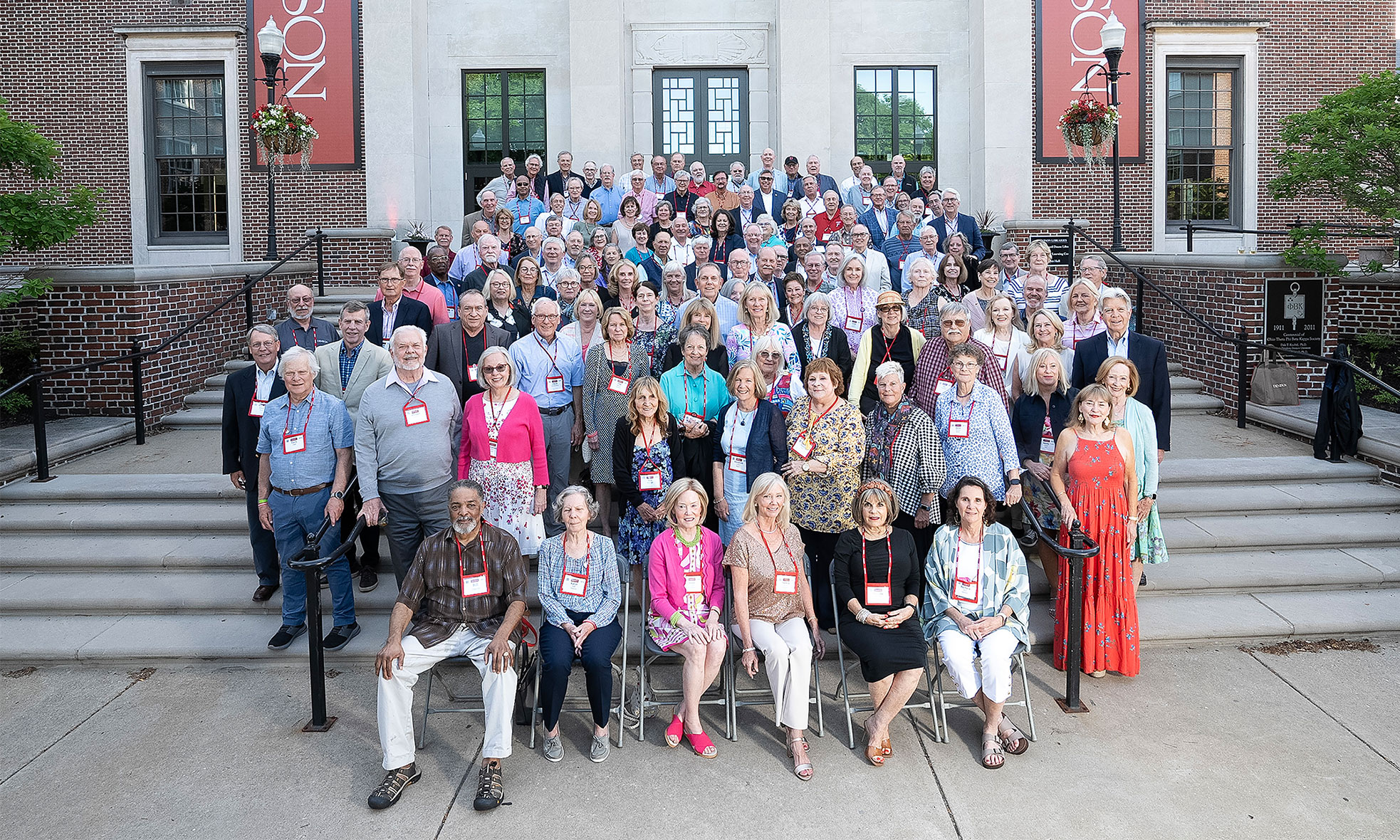 Class of '74 sitting outside the library