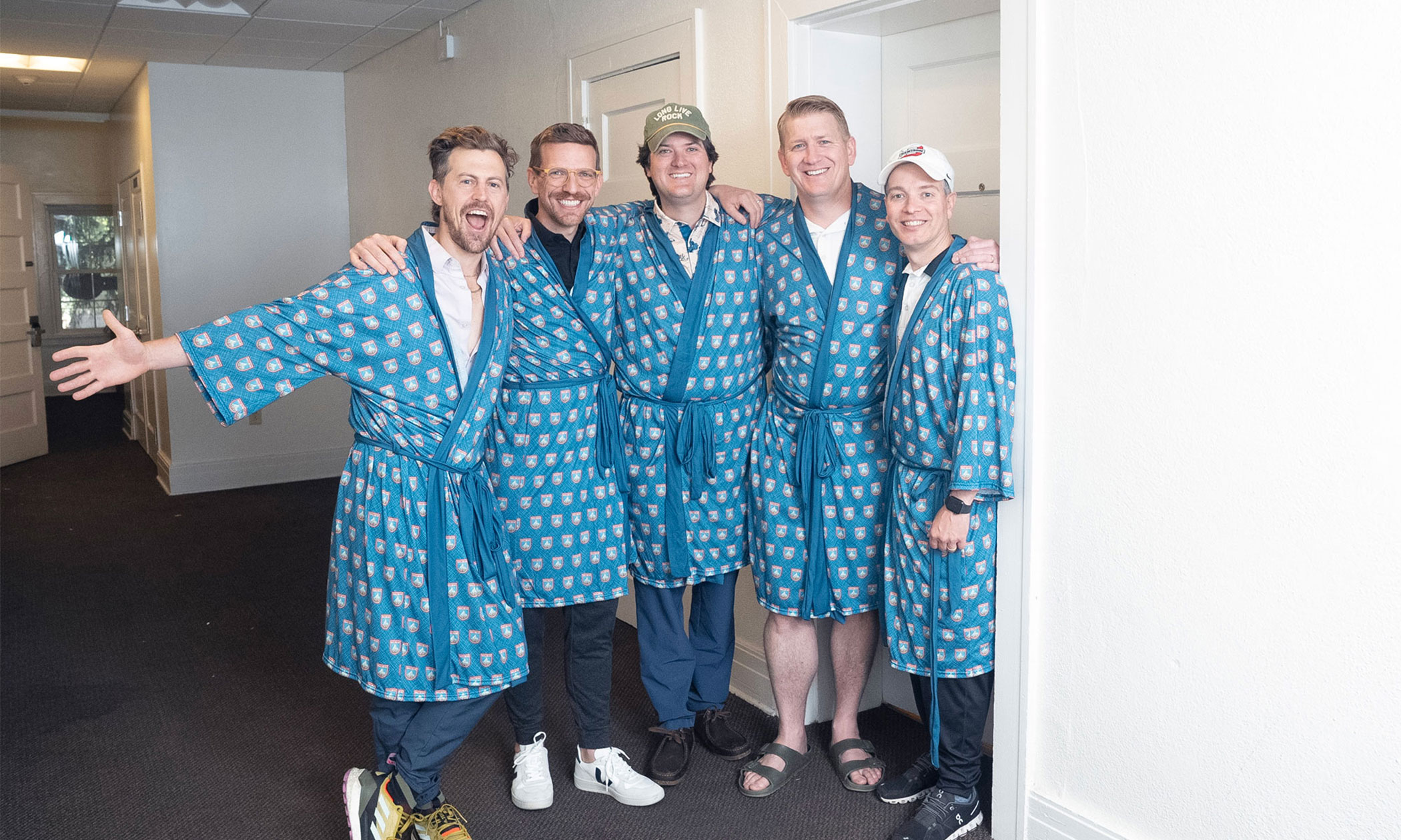 The residents of stone 105 wearing matching bathrobes