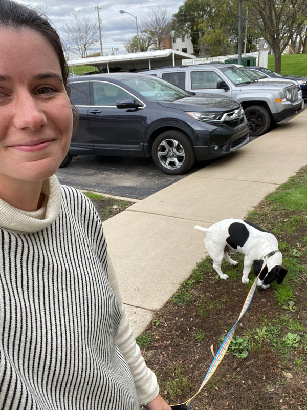 Woman walking dog