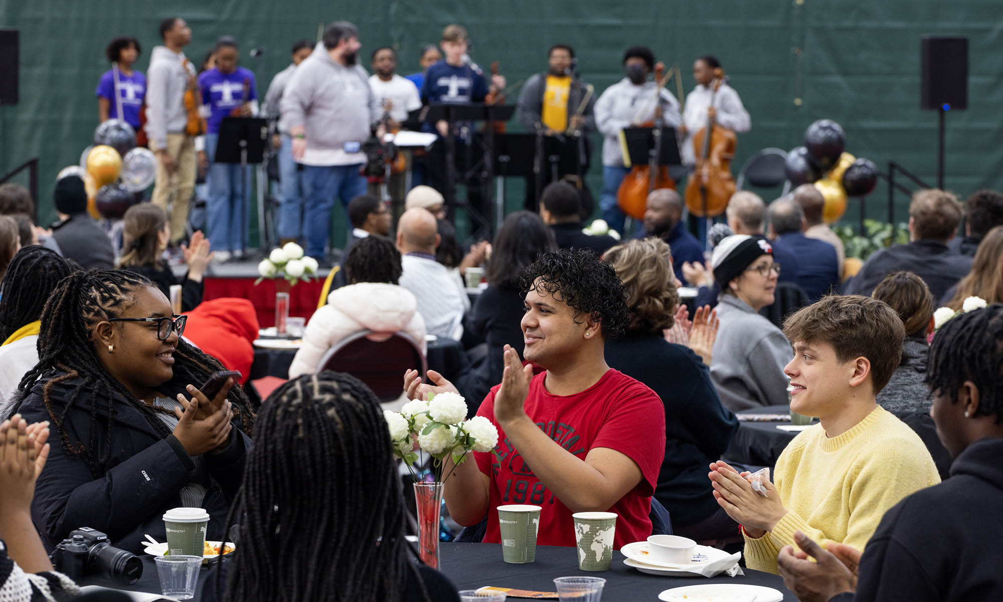 Students gathered at the Mitchell Center enjoy performances during the MLK Celebrations.