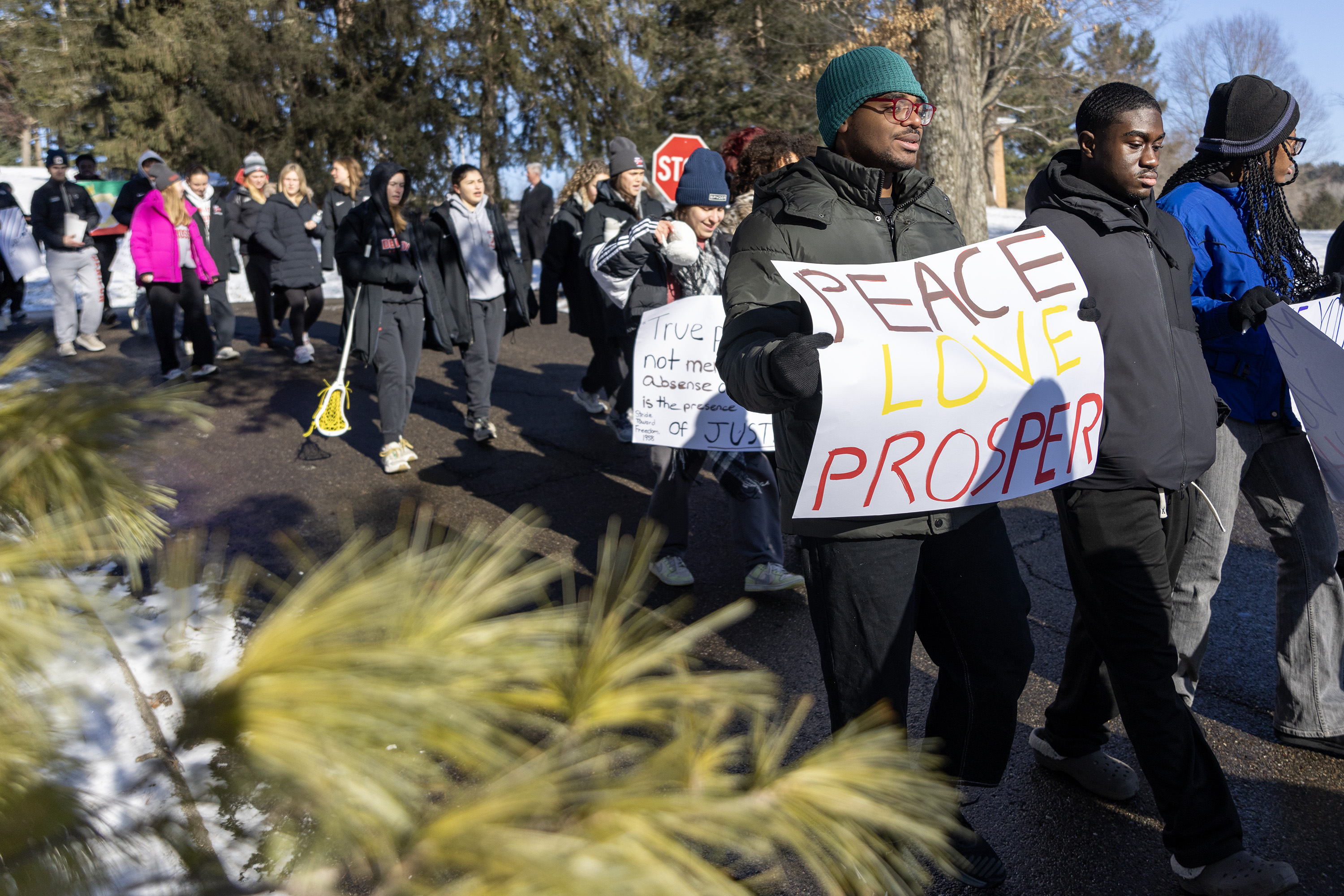 Student participate in the traditional MLK Legacy March from Slayter Hall to the Mitchell Center.