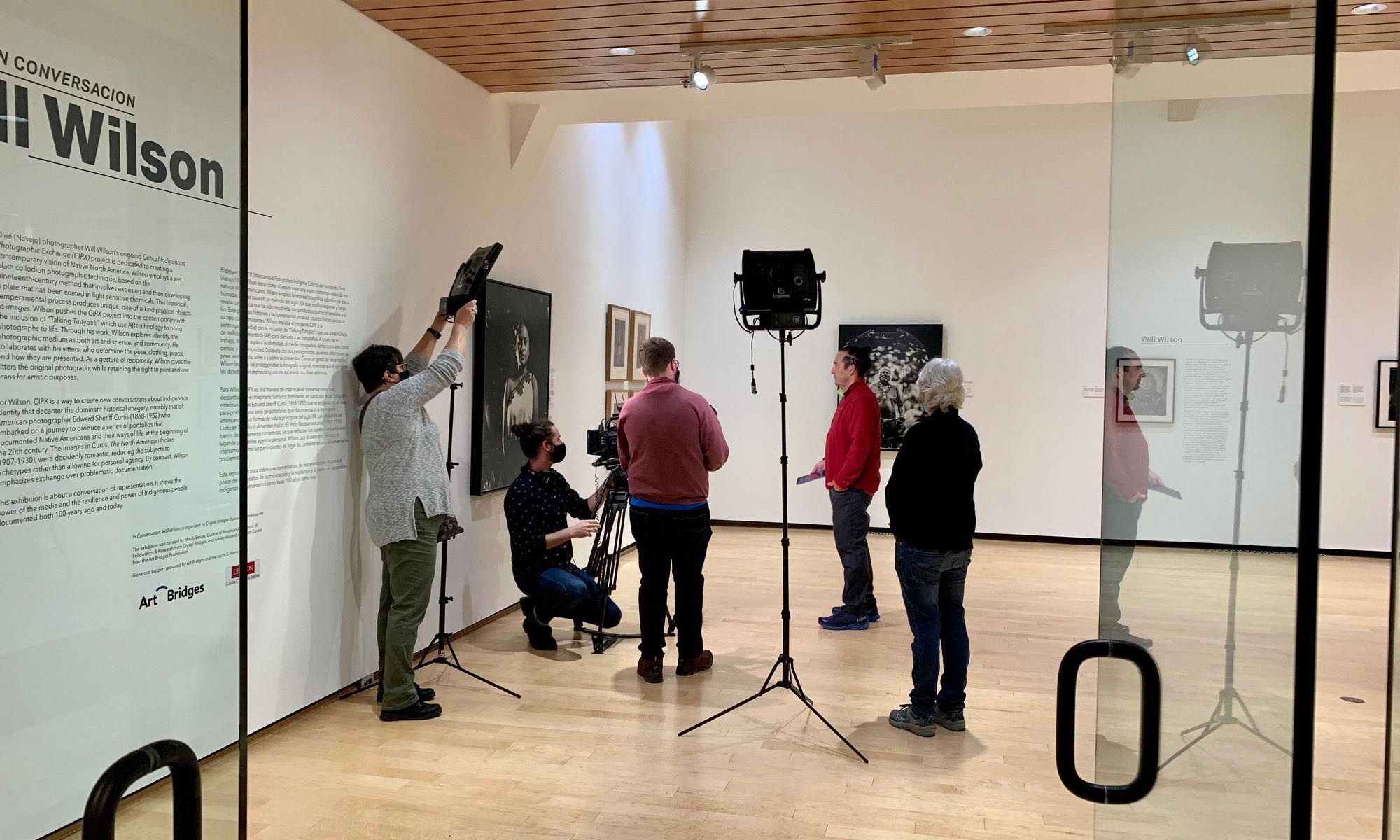 A camera crew filming interviews for Diné (Navajo) photographer Will Wilson’s portraits of Native Americans exhibition.