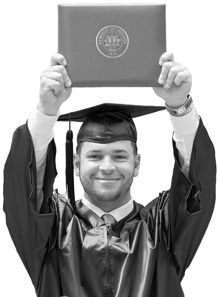 Graduate holding up diploma