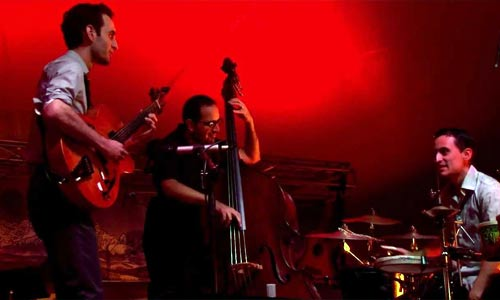 Photo of Julian Lage with percussionist Tupac Mantilla and bass player Jorge Roeder