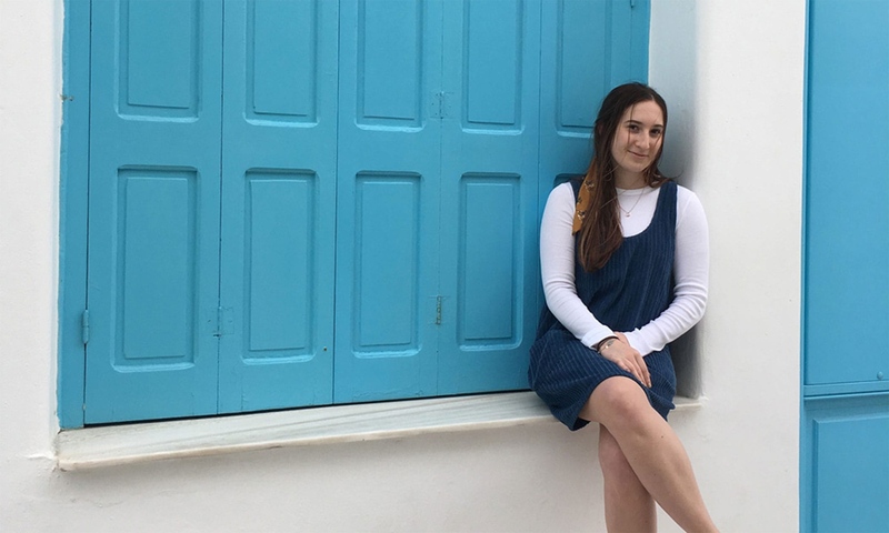 Women sitting in front of door