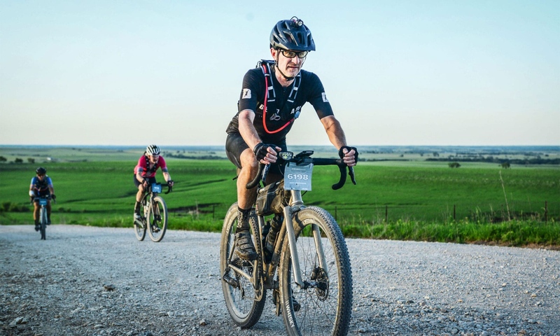 Professor Kretchmar riding his bike through Kansas