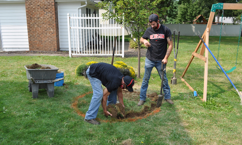 Denison groundskeeping staff building the field