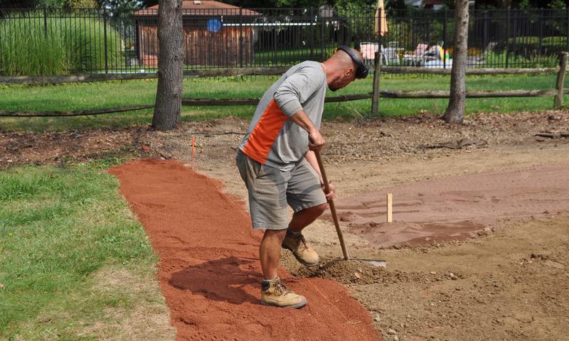 Denison groundskeeping staff building the field