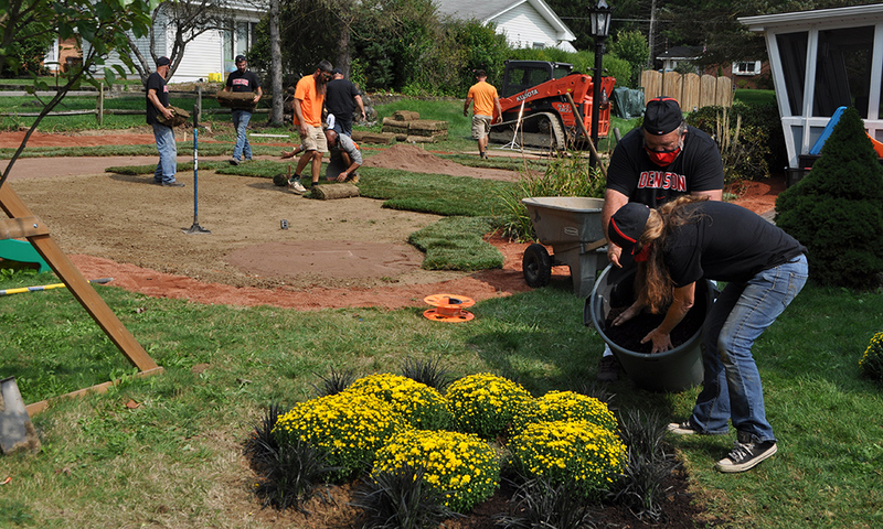 Denison groundskeeping staff building the field