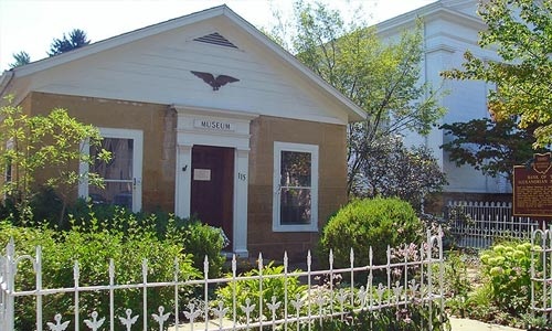 Photo of a house with trees around 