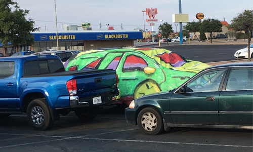 Photo of three cars on a road