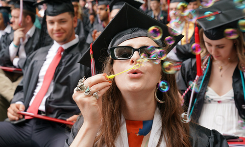 Student blowing bubbles