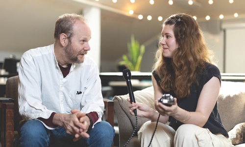 Zoe Meyer '23 with assistant journalism professor Doug Swift