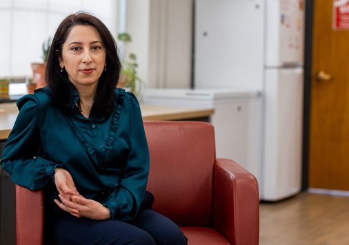 Zarrina Juraqulova sitting on a chair