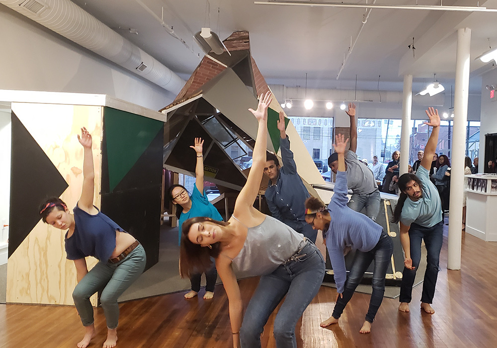 Dancers in front of exhibition