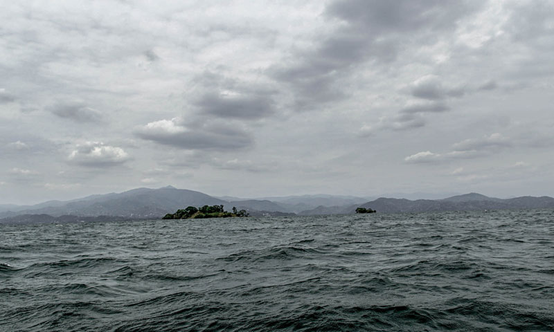 lake with mountains on horizon