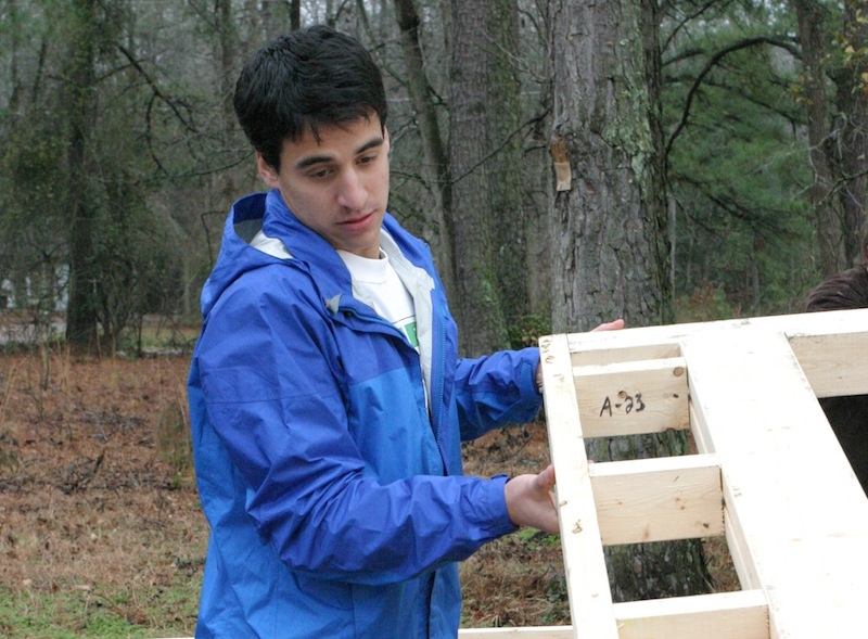 Charlie Allen '14, working for Habitat for Humanity.