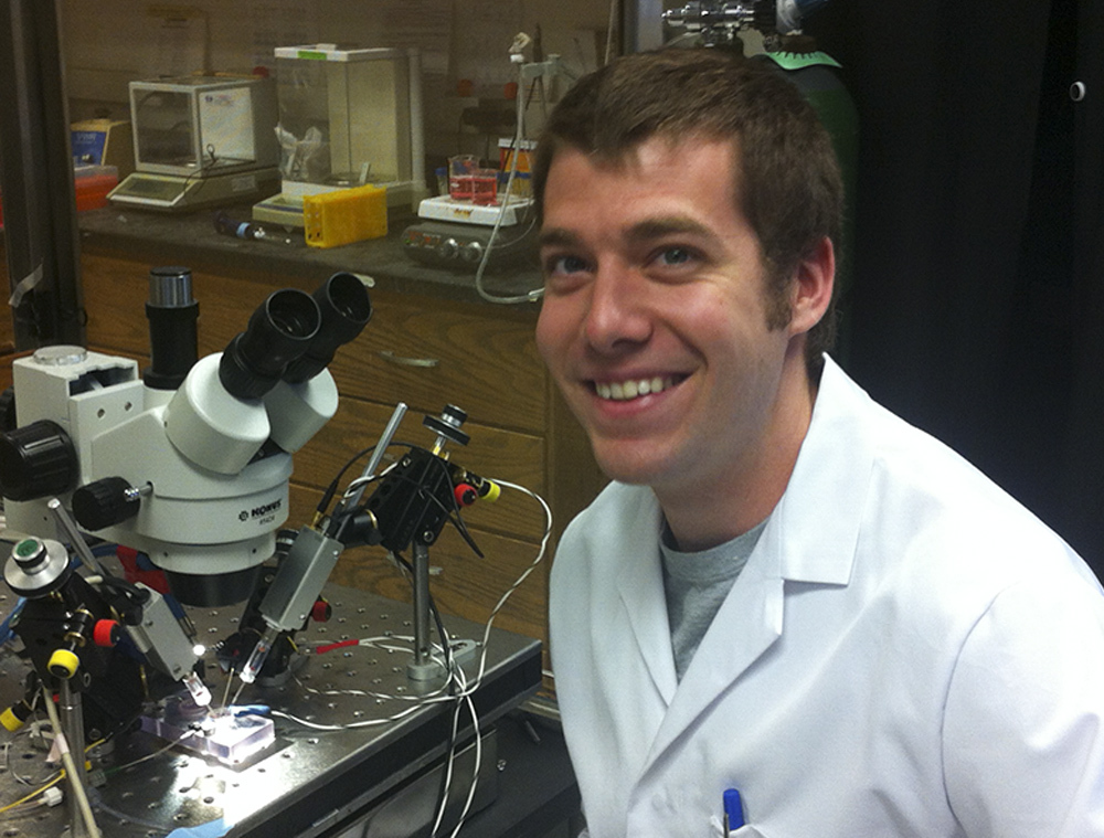 Adam Van Dyke, '08, in the lab.