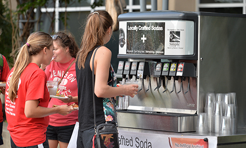 Girl at soda machine