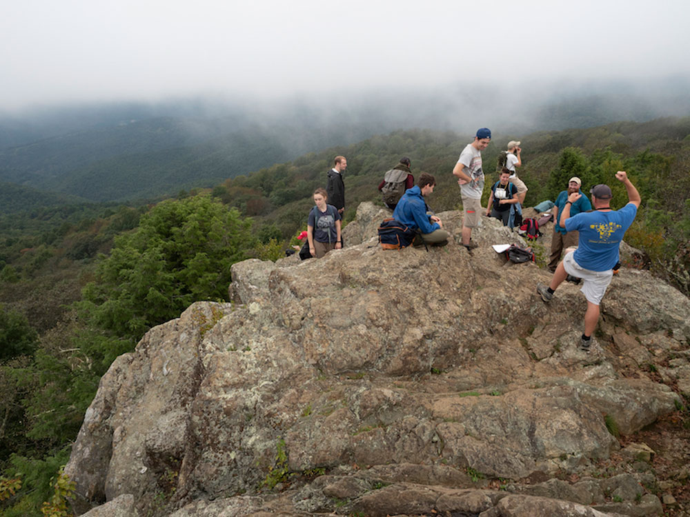 Students on a rock