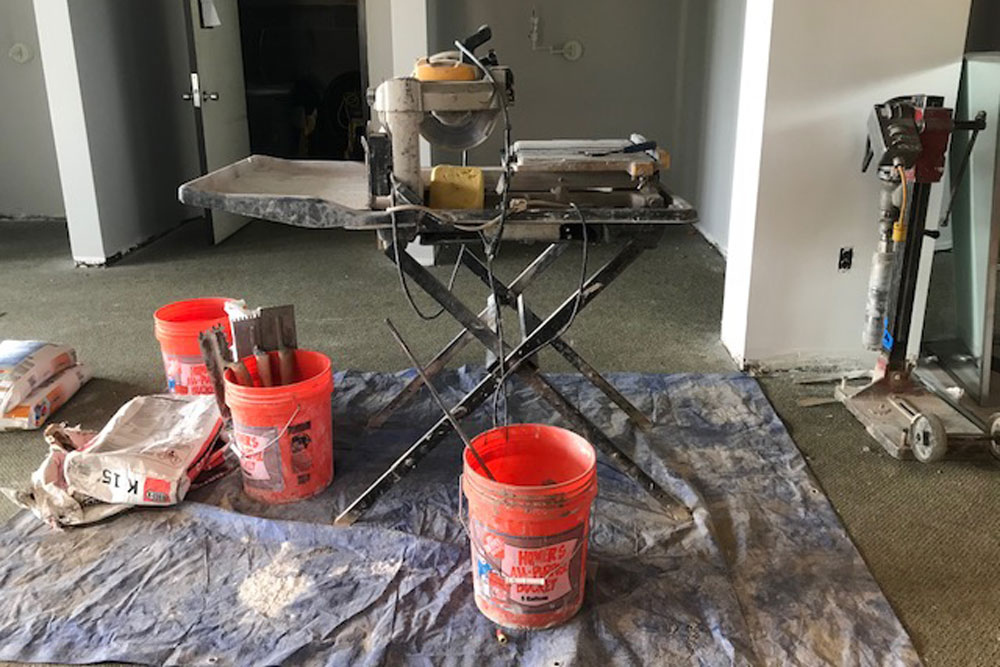 Paint buckets and other renovation materials