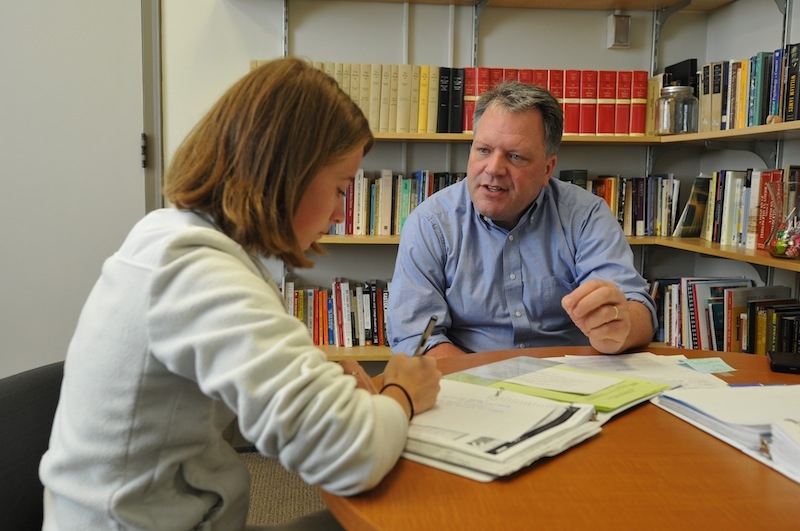 Mark Moller with a student