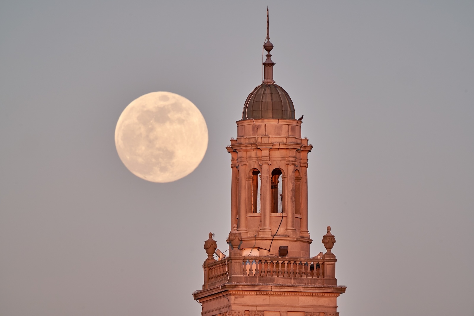 The moon rises over Swasey