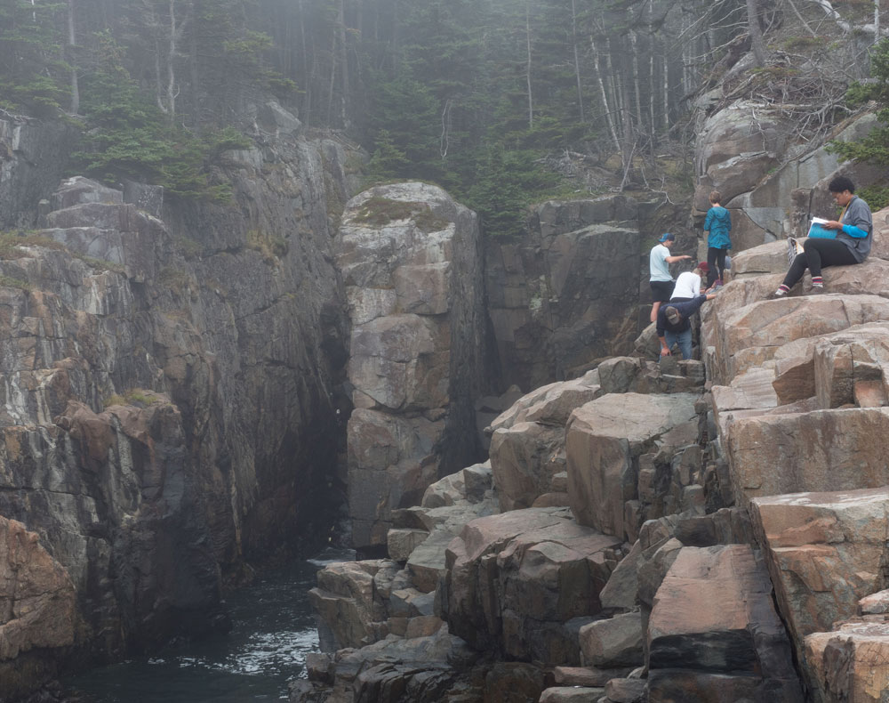 Students exploring the cliff