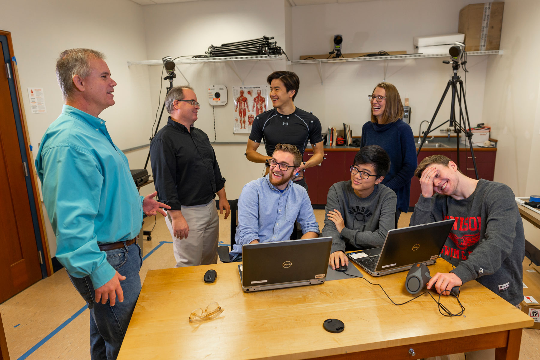 Students review data with Professors