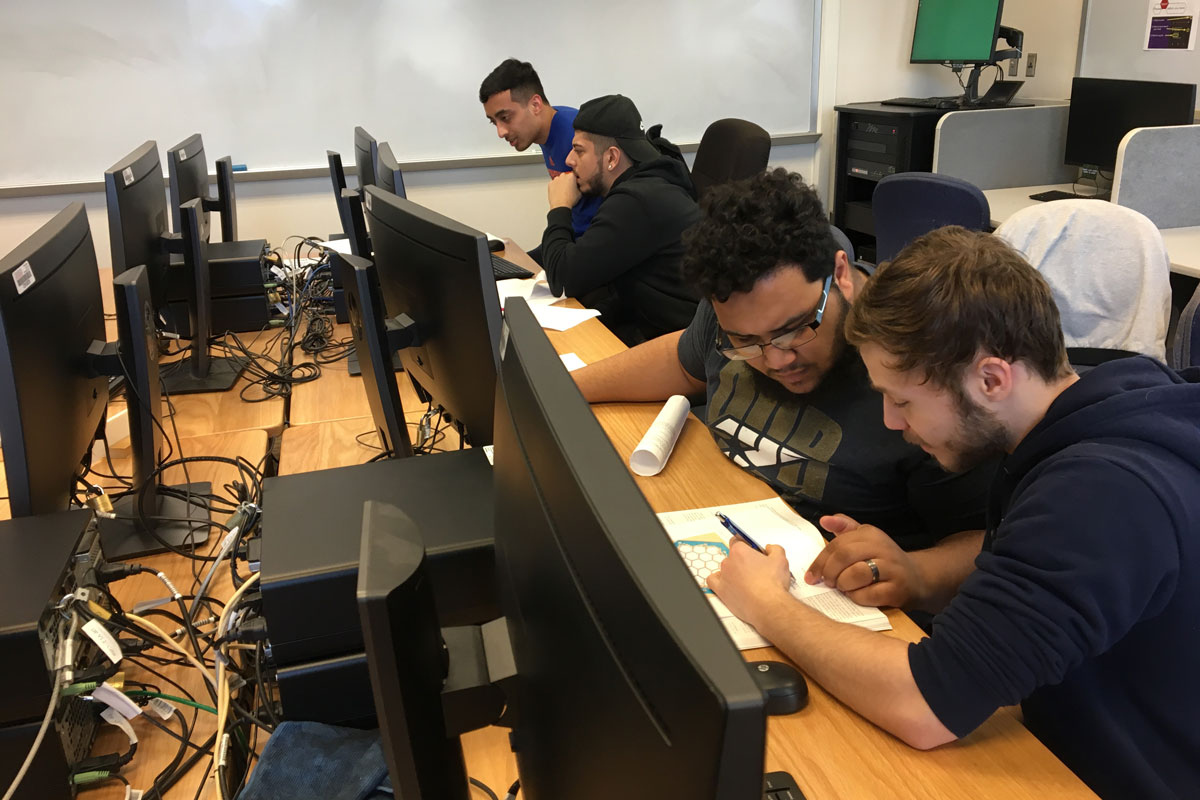 Students working during programming contest