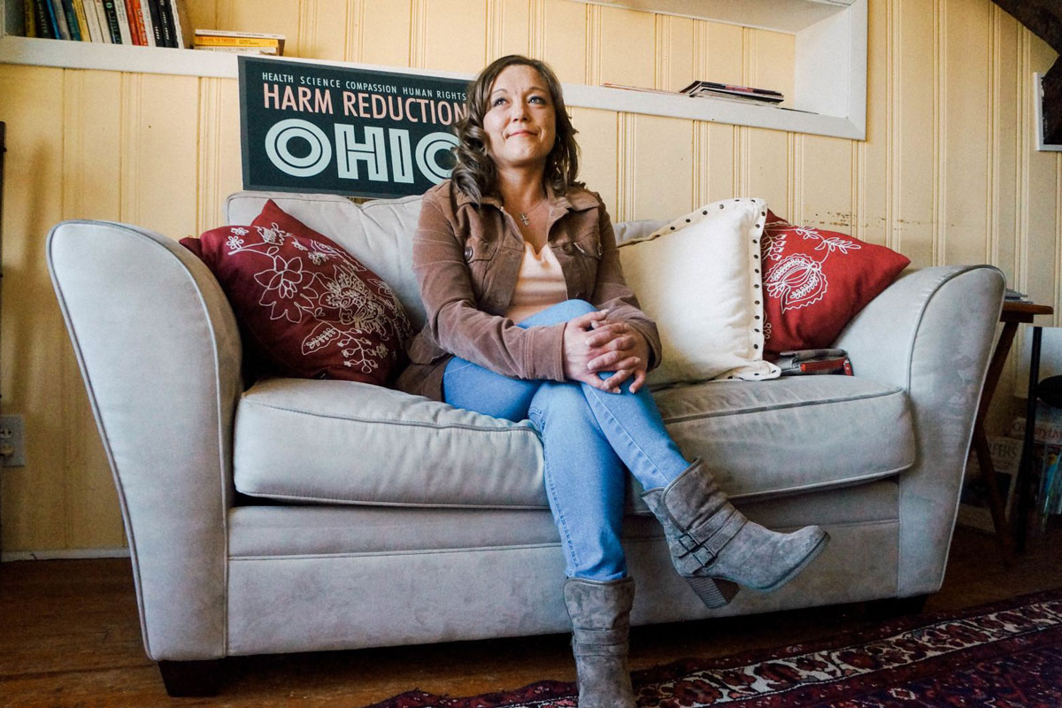 Jenny sitting on couch