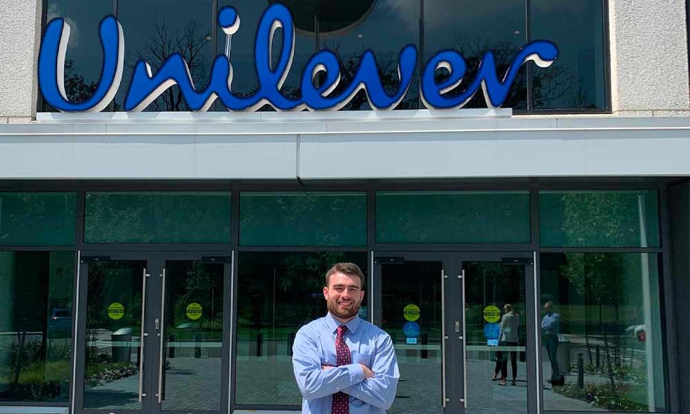 Brendan Boyle stands in front of the Unilever building