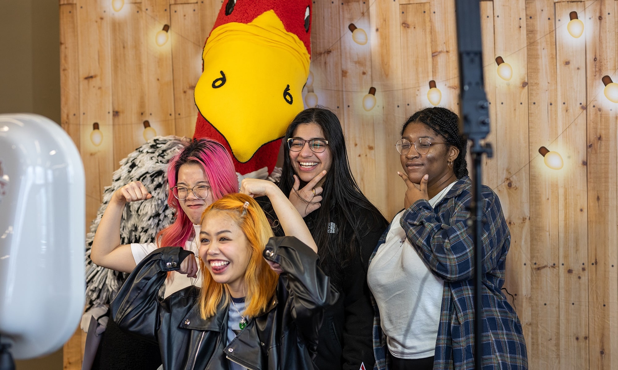 Students posing with Buzzy